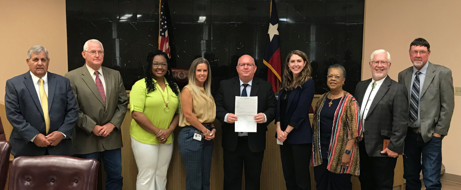 Wood County commissioners proclaimed May as Mental Health Awareness Month at last week’s meeting. From left are Commissioner Virgil Holland Pct. 1, Commissioner Mike Simmons Pct. 3, Keisha Morris-chief SIM officer, Carrie Young-community educator, County Judge Kevin White, Stephanie Wallace-Andrews Center executive assistant, Dr. Beverly Waddleton-Andrews Center board of trustees co-chairman, Lynn Rutland-Andrews Center executive director, and Commissioner Jerry Gaskill Pct. 2